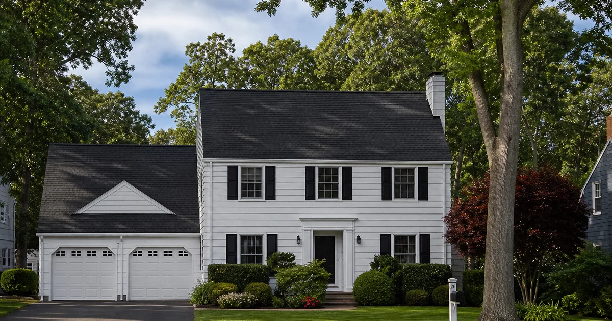 Connecticut suburban home with completed architectural shingle roof, price-guide overlay